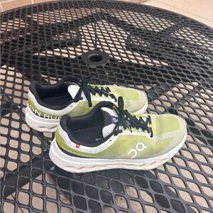 On Running Lime and Black Sneakers